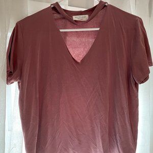 V-neck with choker piece around neck